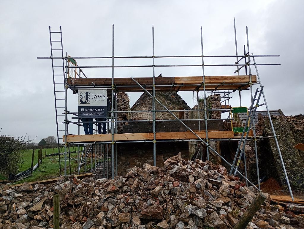 JAWS scaffolding on stone ruin
